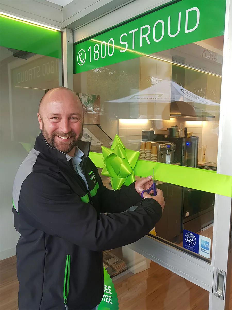 Cammeron Gale cutting the ribbon at the Stroud Homes Melbourne Outer Eastern grand opening